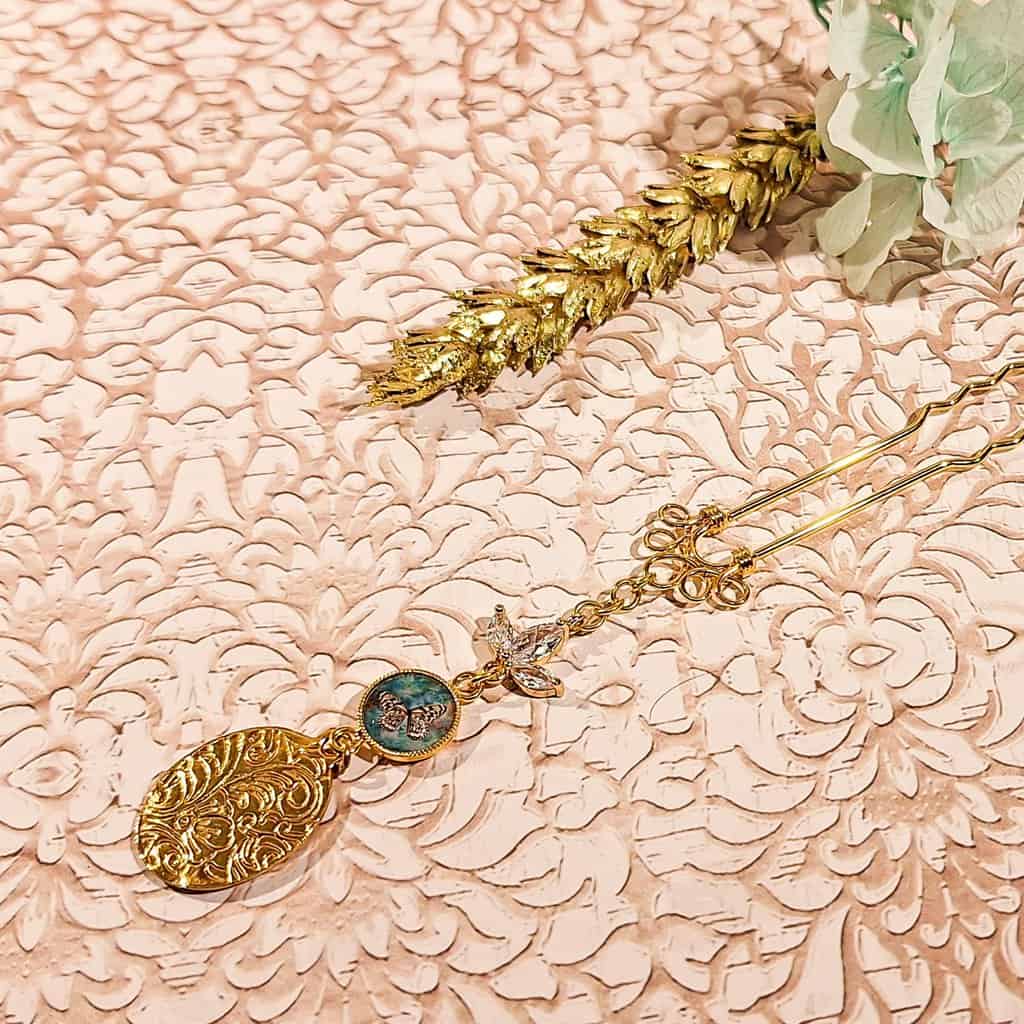 pique strass retro papillon cheveux coiffure resine estampe vert or lydee deco