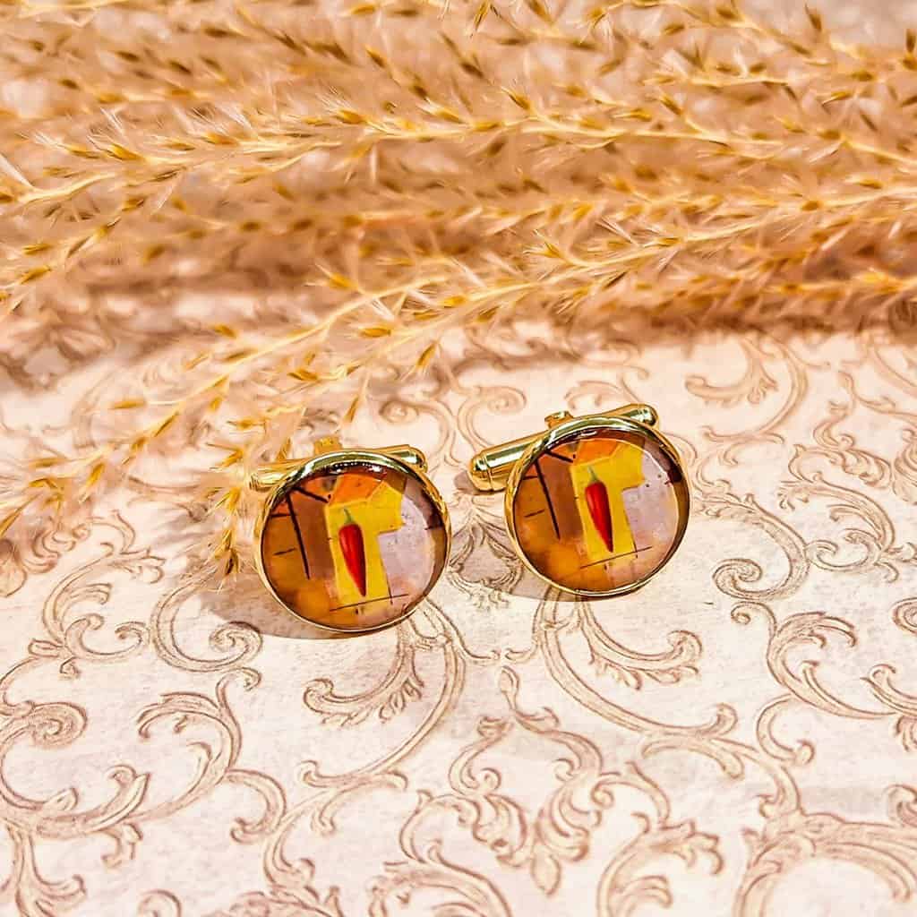 Boutons manchette piment sur fond neutre – accessoire élégant fait main en France