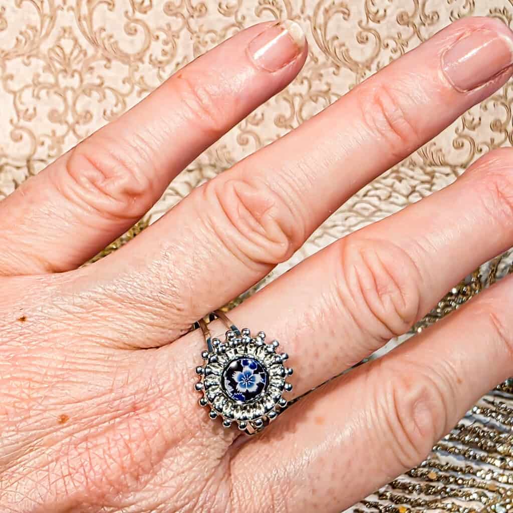 Bague argentée fleur resine cerisier acier inoxydable lydee deco (1) Bague argentée fleur de cerisier réglable en résine