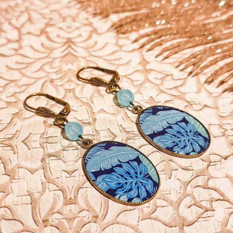 Boucles nature bronze ovales perles resine feuille monstera jungle resine lydee deco